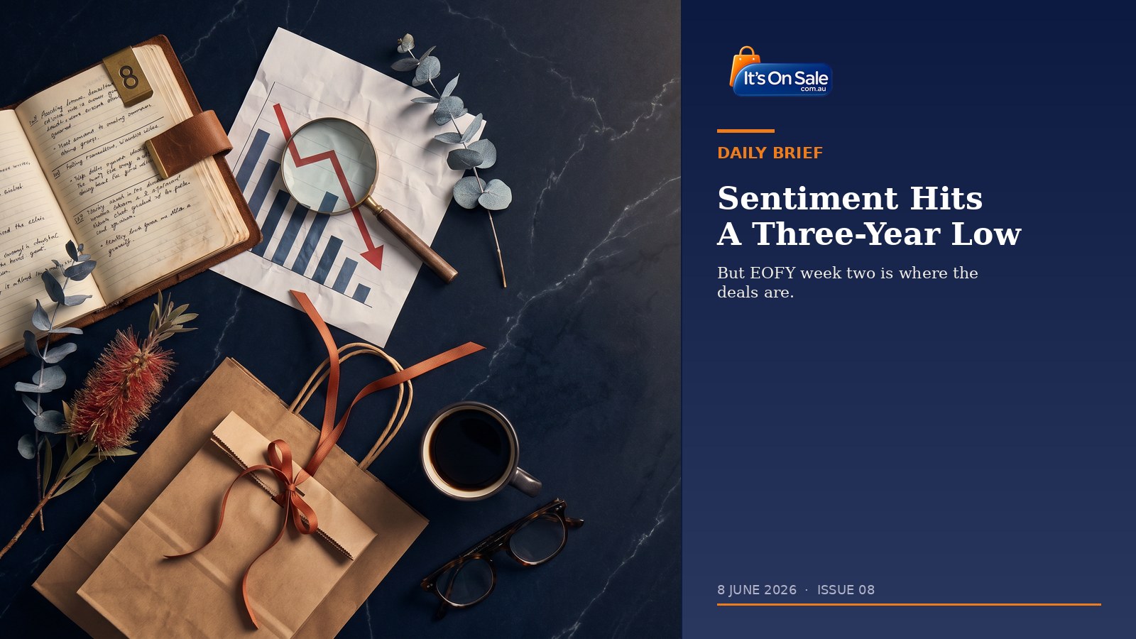Editorial flat-lay of a budget journal with a magnifying glass on a falling bar chart, eucalyptus, kraft shopping bag and orange ribbon, navy marble surface — It's On Sale Daily Brief Issue 08, 8 June 2026